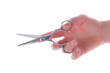 Hairdressing Scissors in hand at the hairdresser on a white background.