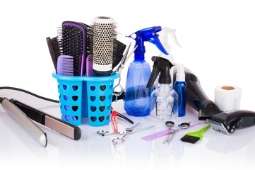 Professional hairdressing equipment - hair dryer, a water bottle, comb, scissors, pins, clips. Tools for hairdresser, beauty salon.