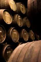 Keuken foto achterwand Barrels in the wine cellar, Porto, Portugal © FreeProd