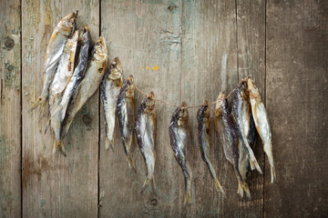 Dried fish on boards