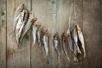 Photo sur Plexiglas Poisson Dried fish on boards