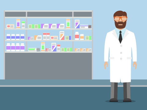 Pharmacist standing near shelves with medications