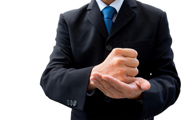 Businessman put his fist on his palm