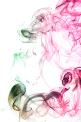 Fototapeta premium Abstract colored smoke from aromatic sticks.