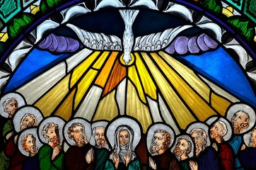 stained glass window depicting Pentecost - 110086915