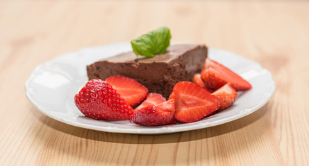 Chocolate dessert with strawberries