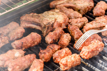 Traditional Romanian Barbecue With Pork Meat Rolls (Mici Or Mititei)