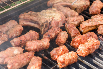 Traditional Romanian Barbecue With Pork Meat Rolls (Mici Or Mititei)