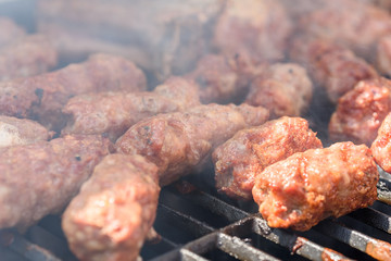 Traditional Romanian Barbecue With Pork Meat Rolls (Mici Or Mititei)