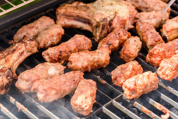 Traditional Romanian Barbecue With Pork Meat Rolls (Mici Or Mititei)