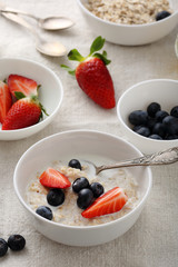 morning oat with strawberries in bowl
