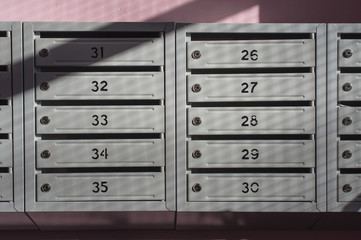metallic mailbox array tidy inside apartment houses