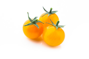 yellow cherry tomatoes isolated on white