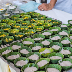 Steamed flour with coconut filling.