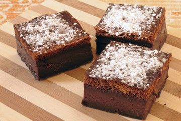 Nice image of magic cake cubes on a wooden board