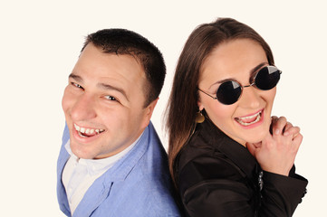 Man and woman with funny faces isolated over white background