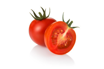 Tomato and half tomato isolated on white