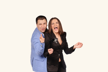 Man and woman with funny faces isolated over white background