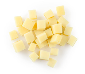 Parmesan cheese cubes on a white background with clipping path. Top view.