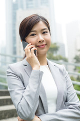 Business woman talk to cellphone