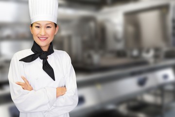 Composite image of portrait of smiling female cook in kitchen