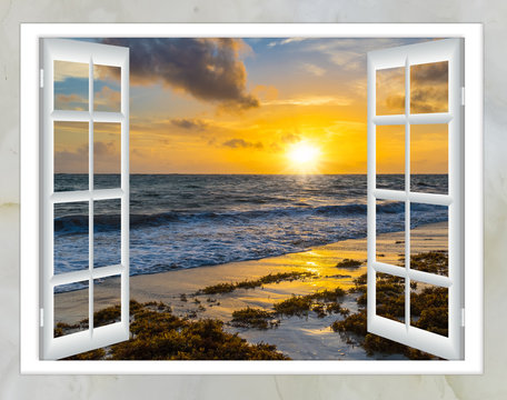 Fototapeta beautiful sunset on the sea view from the window with curtains open