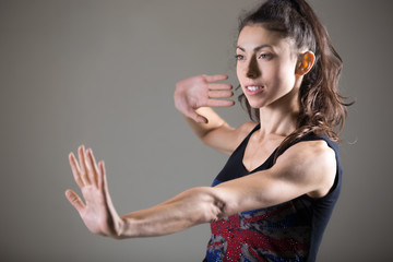 Beautiful caucasian female athlete working out