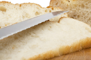 closeup sliced bread and knife