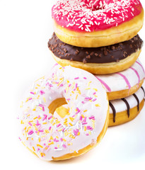 Tasty donuts on white background