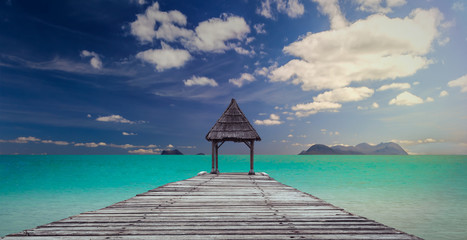Tropical landscape: Paradise beach with a pier
