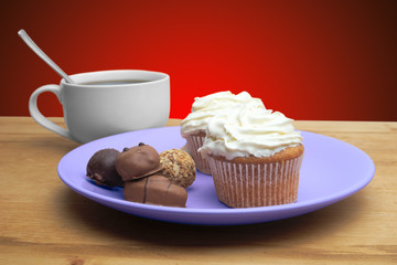 cupcakes with chocolate on the plate