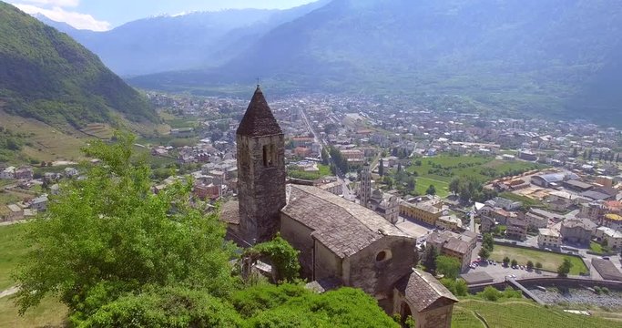 Aerial 4k - Tirano - Valtellina (IT) - Vista della Citt&agrave; e del Santuario della Beata Vergine 