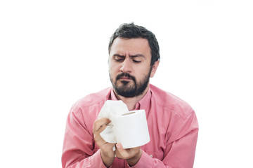 Young Man with Toilet Paper Isolated on the White Background