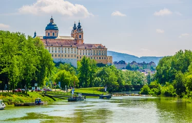 Fotobehang View of the melk abbey in austria from a boat deck © dudlajzov