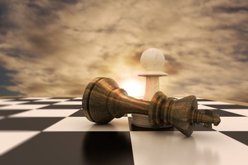 Composite image of white pawn standing over fallen black king