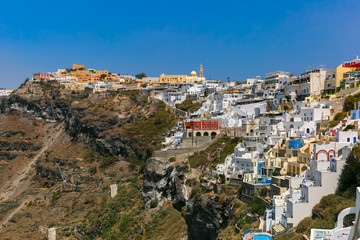 Fira, modern capital of the Greek Aegean island, Santorini, in the sunny day, Greece
