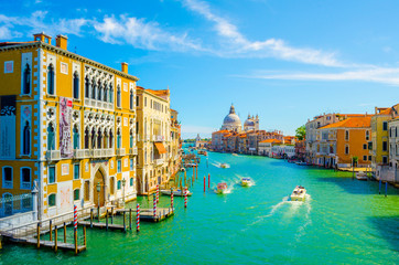 Gorgeous view of the Grand Canal and Basilica Santa Maria della Salute with interesting clouds, Venice, Italy