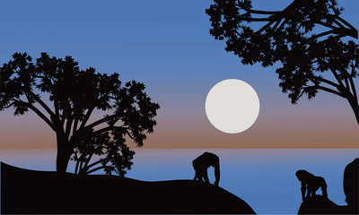 Illustration of gorilla silhouette with moon