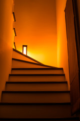 Lights illuminating the stairway at night