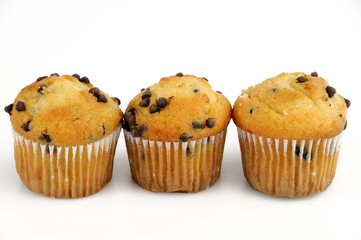 fresh muffins isolated on white background