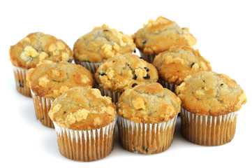 fresh muffins isolated on white background