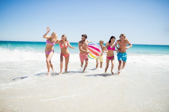  Friends Having Fun At The Beach