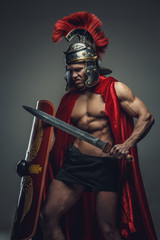 Obraz premium A man in Roman soldier costume.