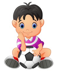 Cute boy holding a soccer ball