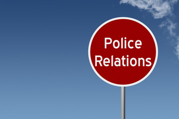 Round highway road sign with text police relations