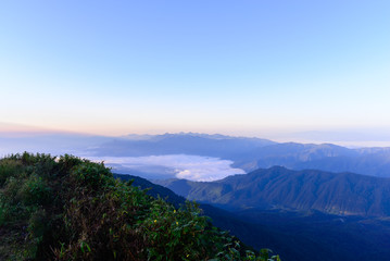 Sunrise and mist with mountain in Chiang Mai, Thailand.