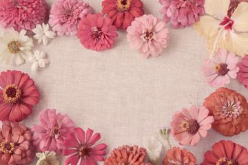Fototapeta na wymiar Pink flowers copy space background, selective focus, toning