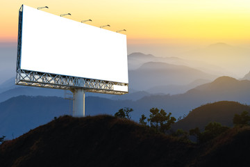 Blank billboard for advertising with forest background, advertising everywhere concept.