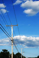 power pole under blue sky