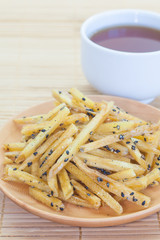 Brown Sugar - Glazed sweet potato fries with black sesame